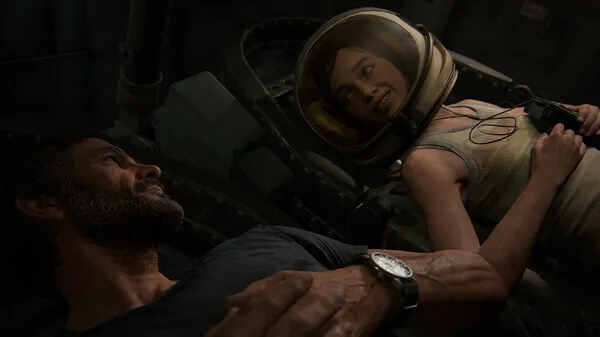 Cena do jogo The Last of Us Part II, mostrando Joel e Ellie deitados em um museu espacial. Ellie está usando um capacete de astronauta, sorrindo e olhando para Joel.