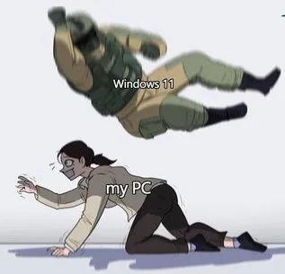 Meme soldado representando w11 pulando em cima do pc