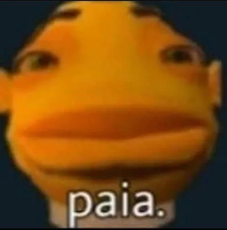 Meme em close-up e de baixa resolução do personagem Oscar (o peixe) do filme O Espanta-Tubarões, com a legenda "paia.", expressando desinteresse ou desgosto.